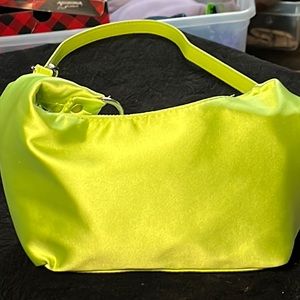 Woman’s green Crossbody purse